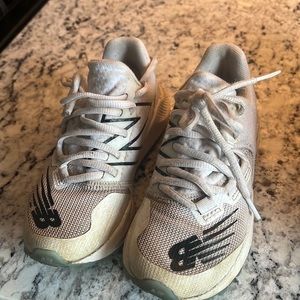 Gently used new balance baseball turf shoes